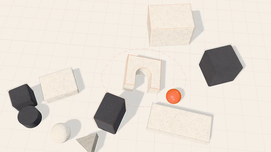 The same scene in wireframe view, three blocks selected in orange as friction points while the ball circles them.